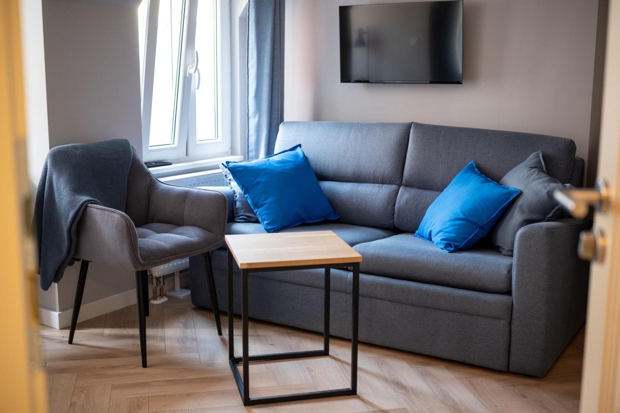 Apartamenty Drevny Kocur Poznan Bagian luar foto
